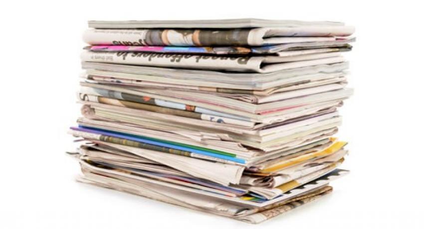 Picture of stacked newspapers